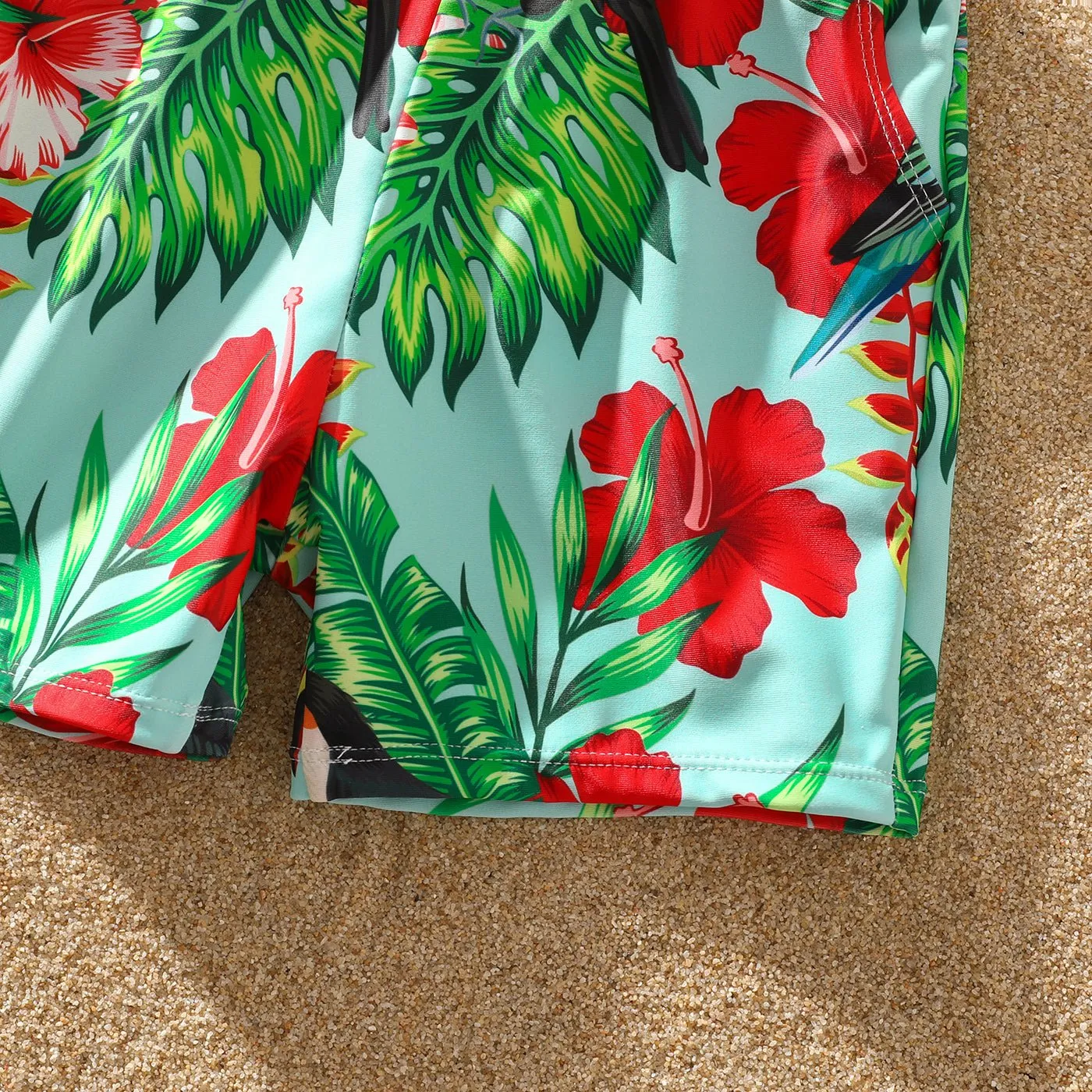 Family Matching Solid Scallop Trim Strappy Two-piece Swimsuit and Allover Floral Print Swim Trunks Shorts