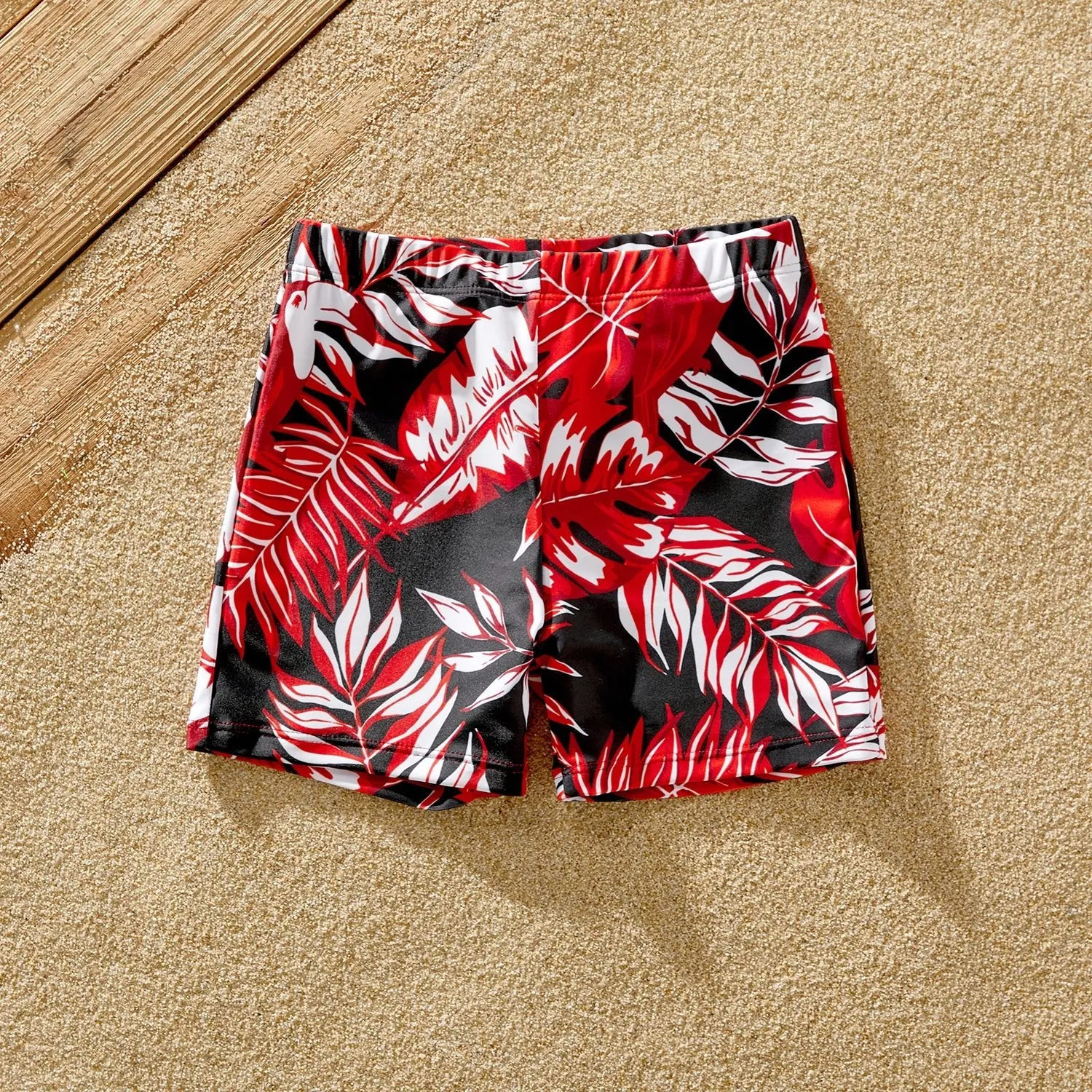 Family Matching Solid Scallop Trim Strappy Two-piece Swimsuit and Allover Floral Print Swim Trunks Shorts