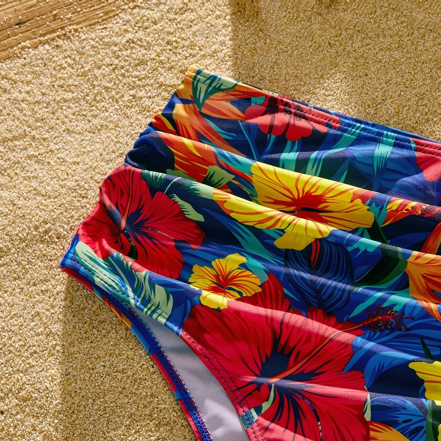 Family Matching Solid Scallop Trim Strappy Two-piece Swimsuit and Allover Floral Print Swim Trunks Shorts