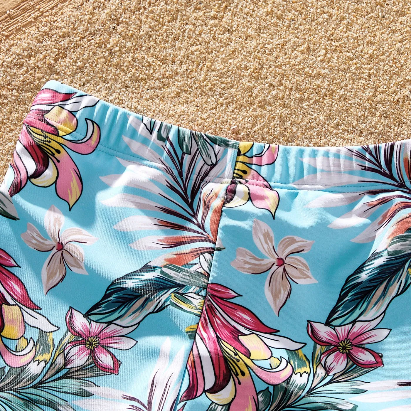 Family Matching Solid Scallop Trim Strappy Two-piece Swimsuit and Allover Floral Print Swim Trunks Shorts