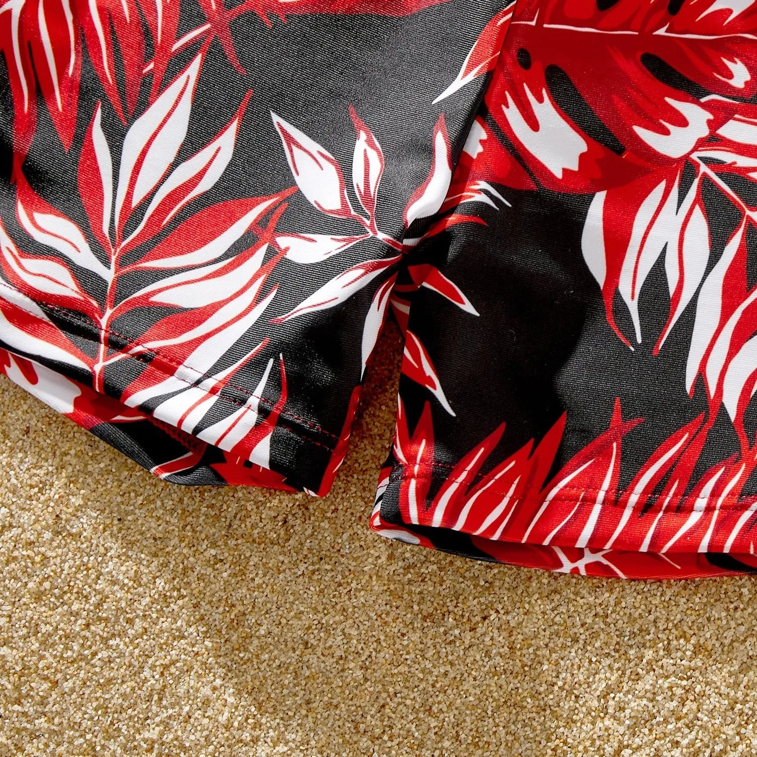 Family Matching Solid Scallop Trim Strappy Two-piece Swimsuit and Allover Floral Print Swim Trunks Shorts