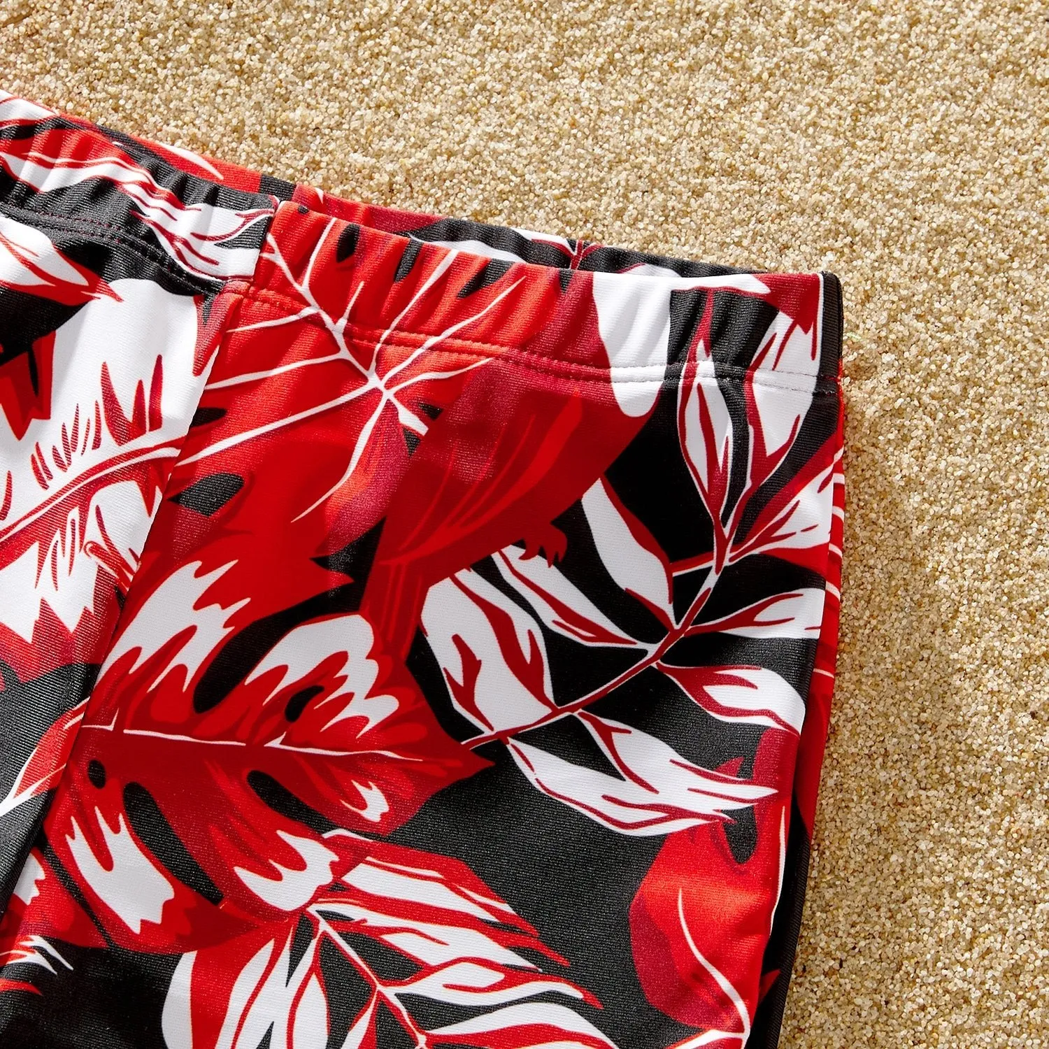 Family Matching Solid Scallop Trim Strappy Two-piece Swimsuit and Allover Floral Print Swim Trunks Shorts