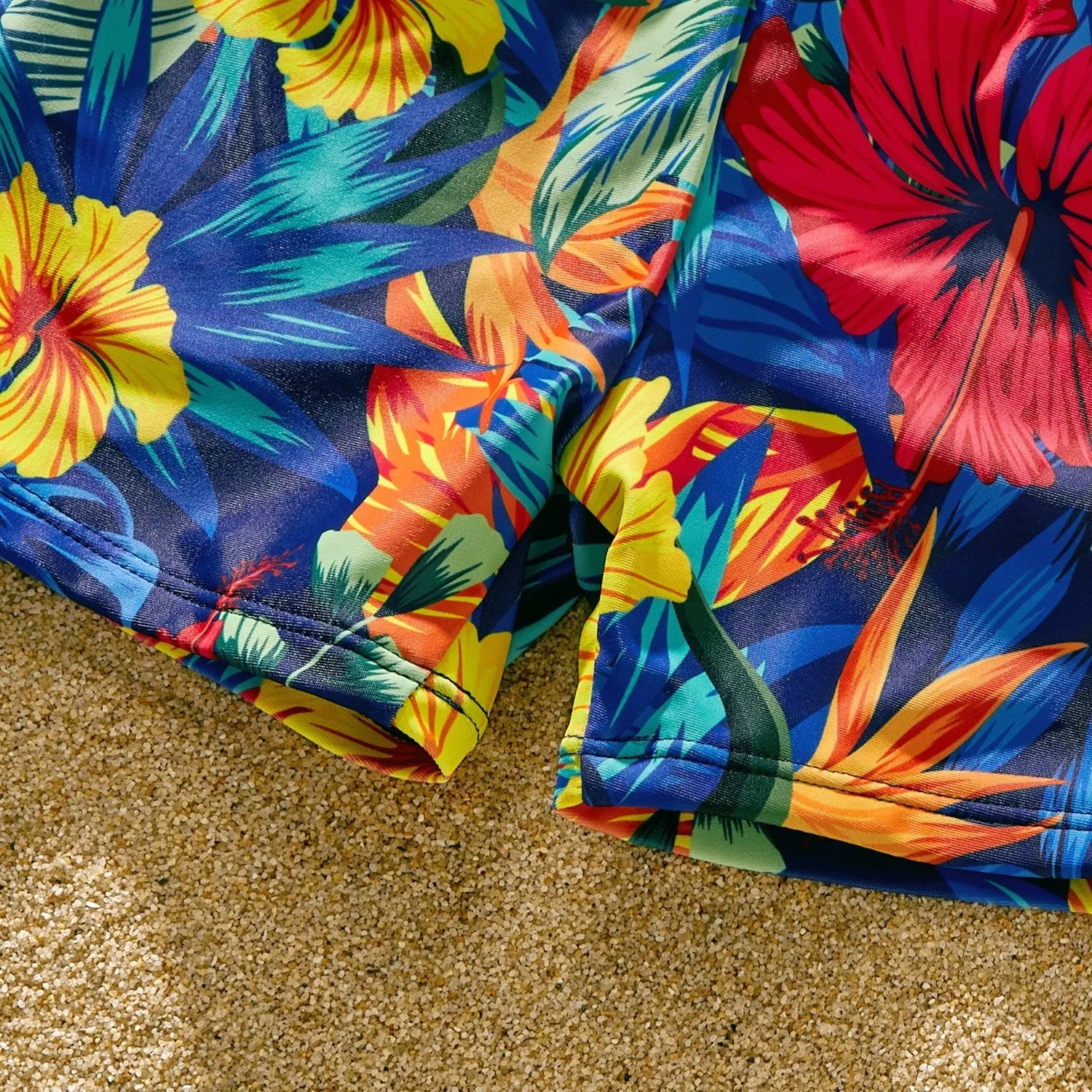 Family Matching Solid Scallop Trim Strappy Two-piece Swimsuit and Allover Floral Print Swim Trunks Shorts