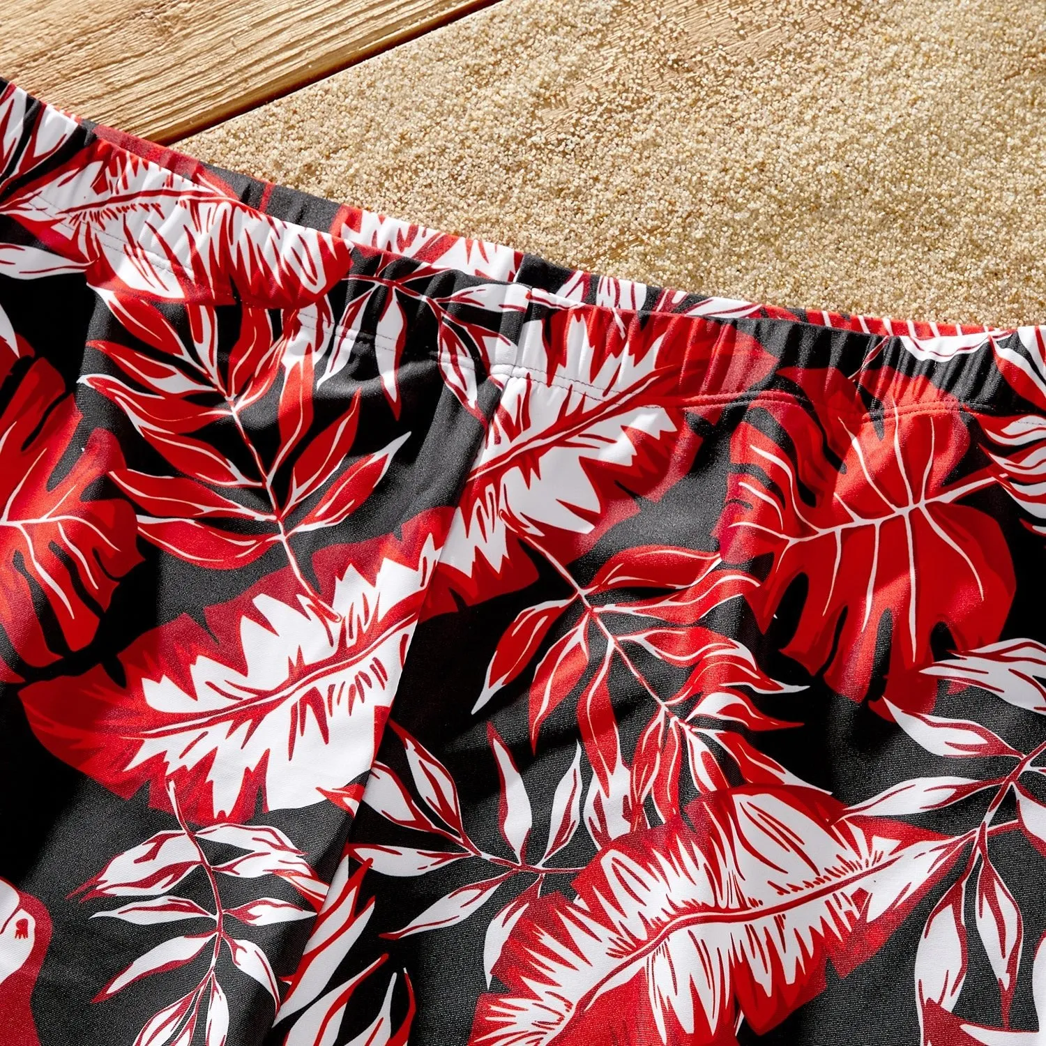 Family Matching Solid Scallop Trim Strappy Two-piece Swimsuit and Allover Floral Print Swim Trunks Shorts